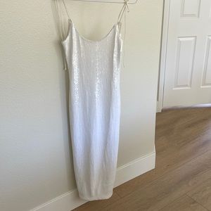 white sequin dress with back slit, form fitting, size: small